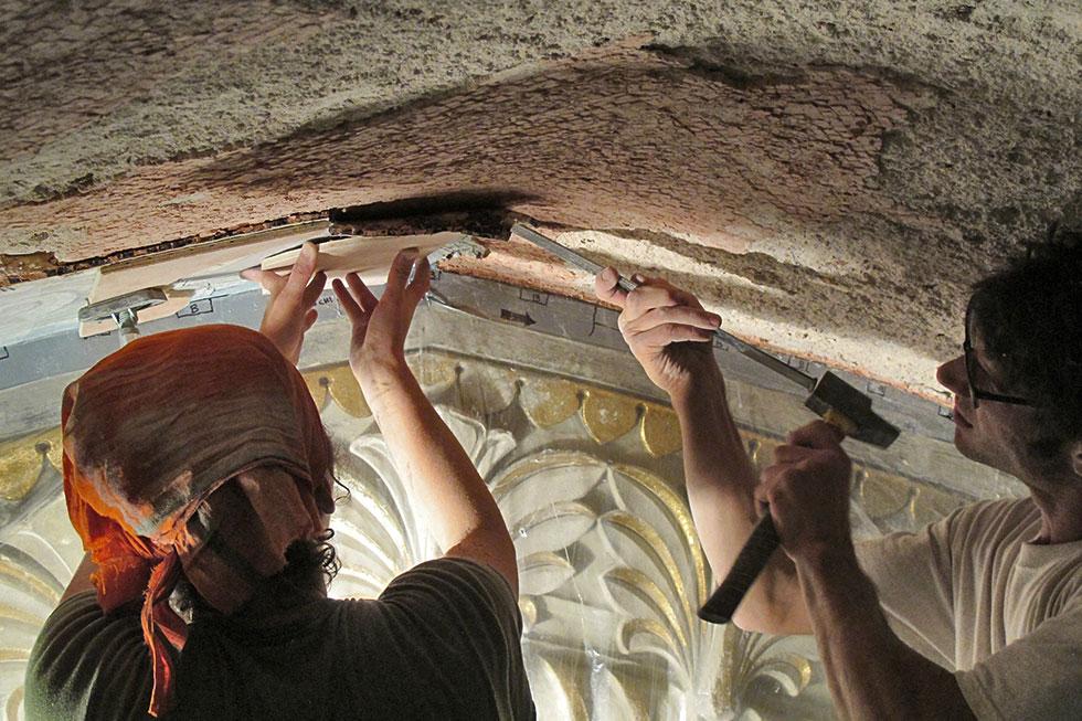 The mosaic is detached from the damaged support.