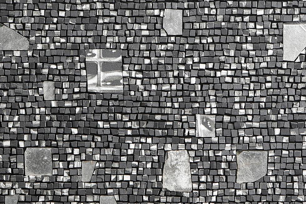 detail of a contemporary Opus Scutulatum with stoneware.